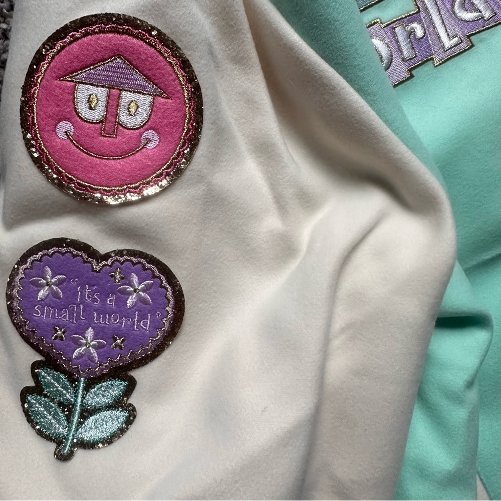 Disney Parks x Stoney Clover Lane It’s a Small World Varsity Jacket XL NWT - Picture 7 of 16